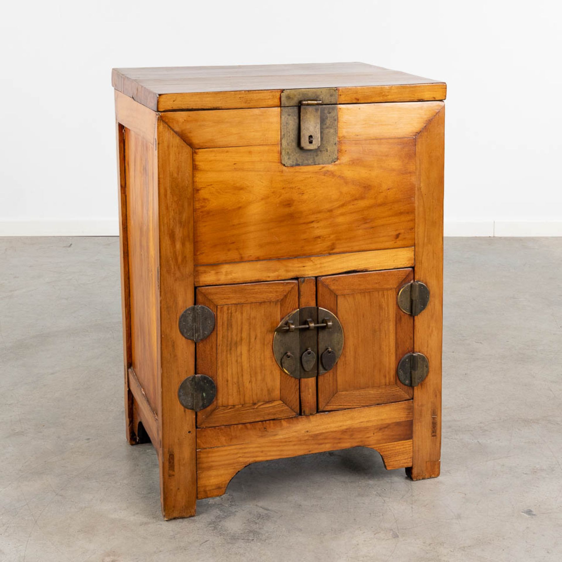 A small Chinese cabinet, hardwood with brass hardware. (L:47 x W:62 x H:88 cm)