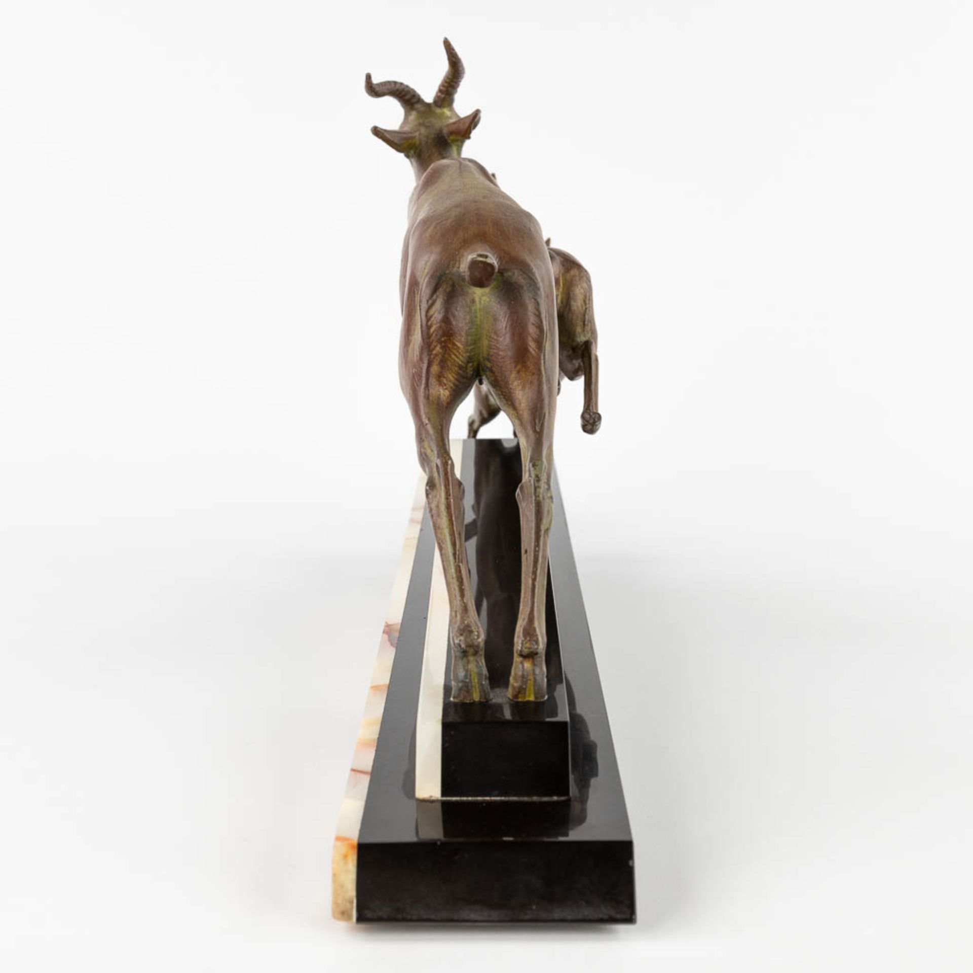 Two running deer, spelter on an onyx base, Art Deco. (L:11 x W:66 x H:31 cm) - Image 7 of 11
