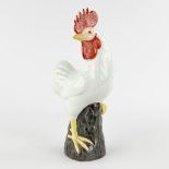 A large Chinese porcelain rooster, Republic Period, 20th C. (L:11,5 x W:19,5 x H:34,5 cm)