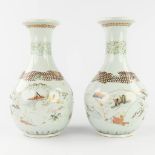 A pair of Japanese vases, decorated with hand-painted landscapes. 19th C. (H:37,5 x D:21 cm)