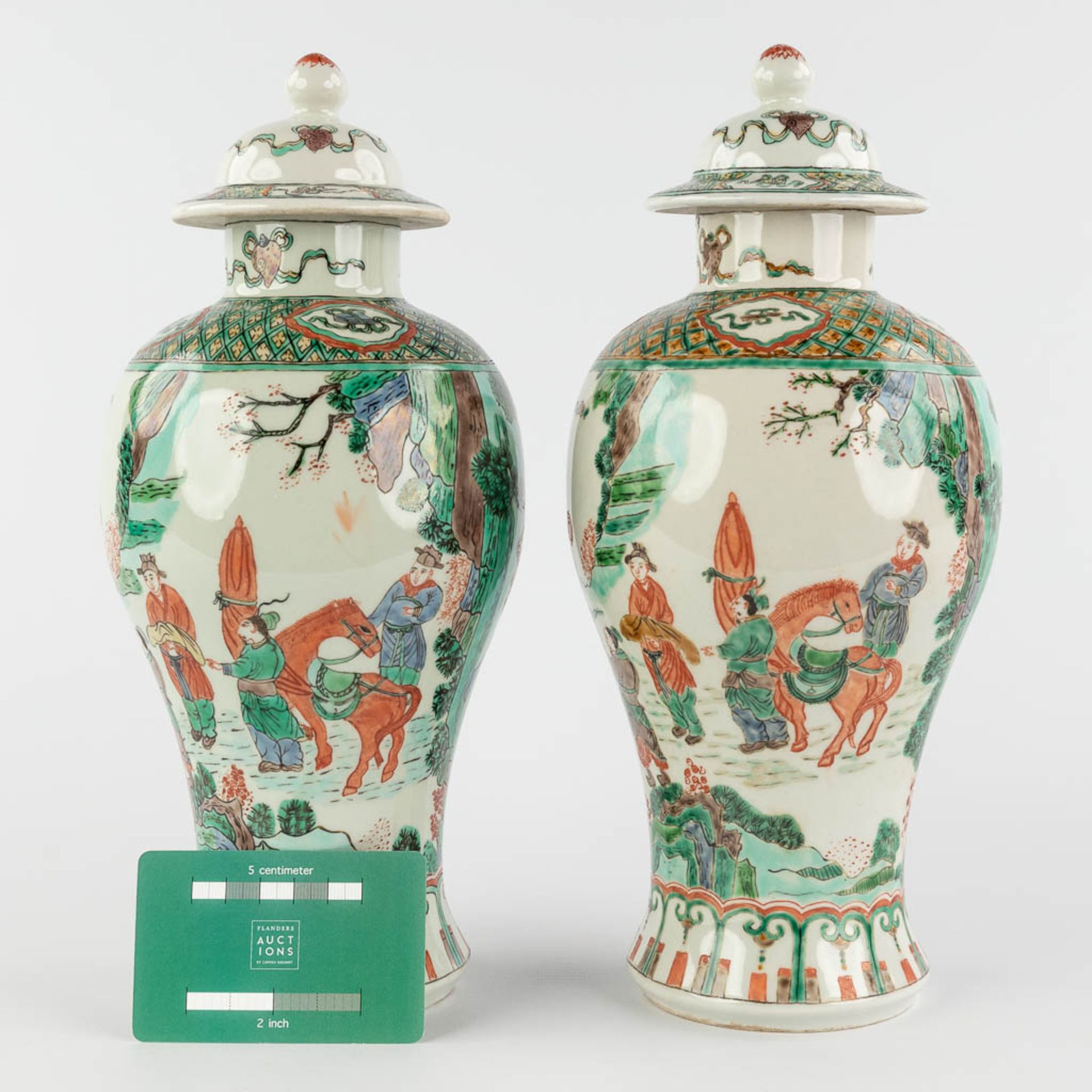 A pair of Chinese Famille Verte with farmers and symbols of happiness. 19th/20th C. (H:29 x D:13 cm) - Image 2 of 14