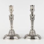 Christofle, a pair of silver-plated candle holders in Louis XVI style. 20th C. (H:23 x D:12,5 cm)