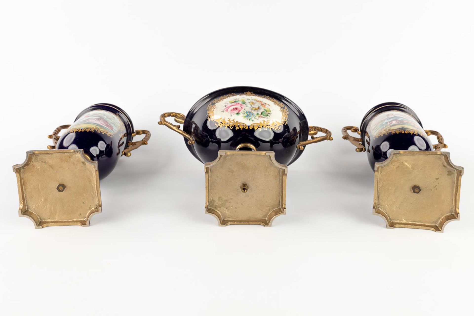 A three-piece mantle garniture, marked A.C.F. Sèvres. Porcelain mounted with bronze. 20th C. (L:11 x - Image 7 of 18