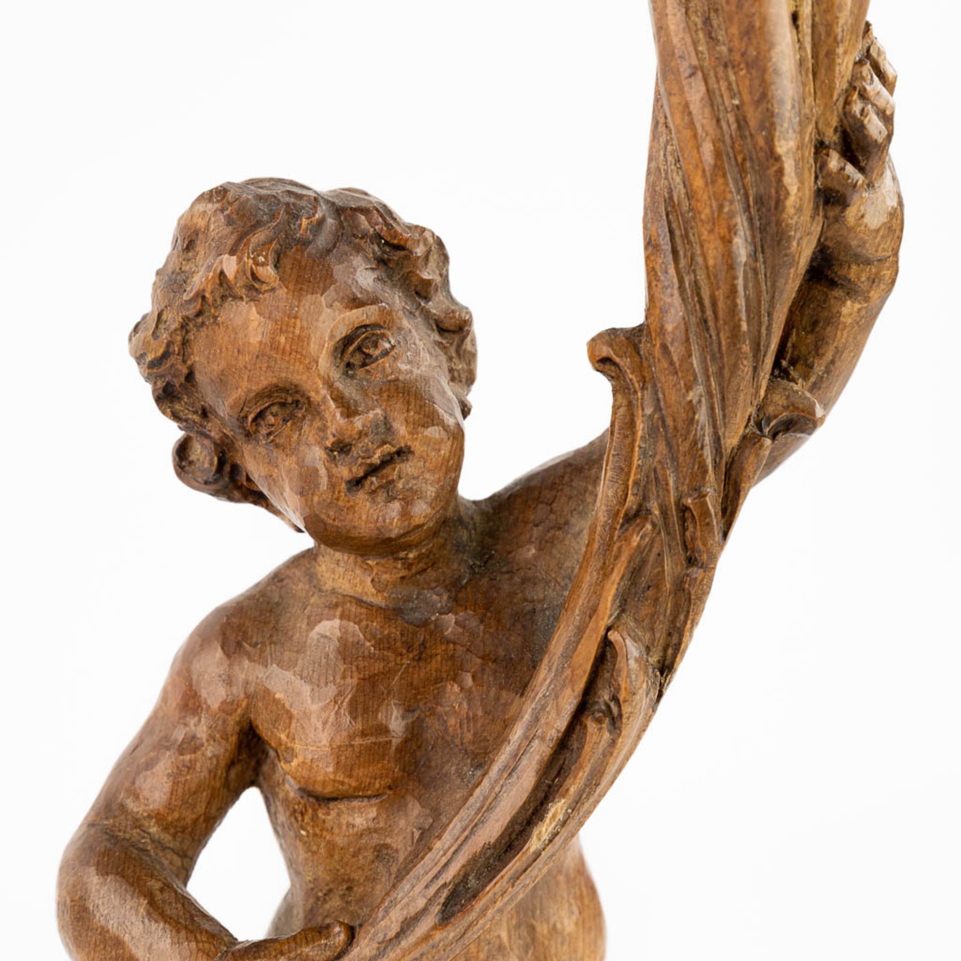 A pair of wood-sculptured candle holders, with putti. 19th C. (L:9 x W:12 x H:34 cm) - Bild 7 aus 12