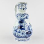 Delft, an antique pitcher with romantic scène, blue-white faience. 18th c. (L:17 x W:20 x H:33 cm)