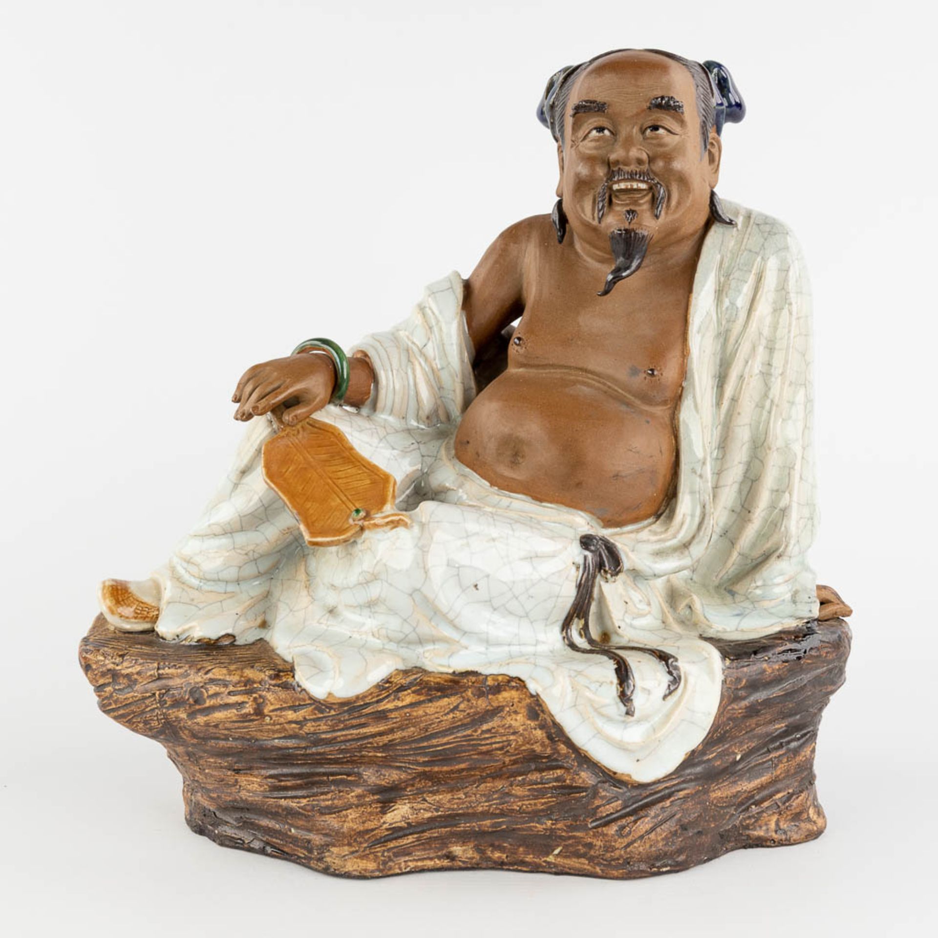 A Japanese wise man, glazed terracotta. 20th C. (L:19 x W:31 x H:31 cm)