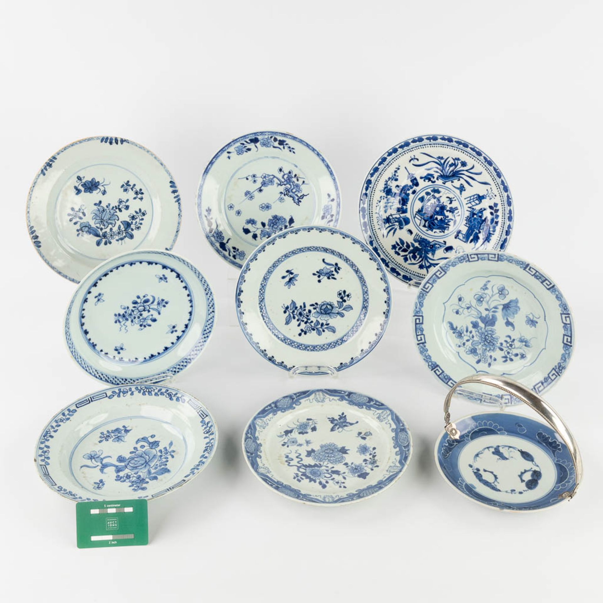 Nine Chinese blue-white decor, of which one has a silver holder. 19th/20th C. (D:23,5 cm) - Image 2 of 16
