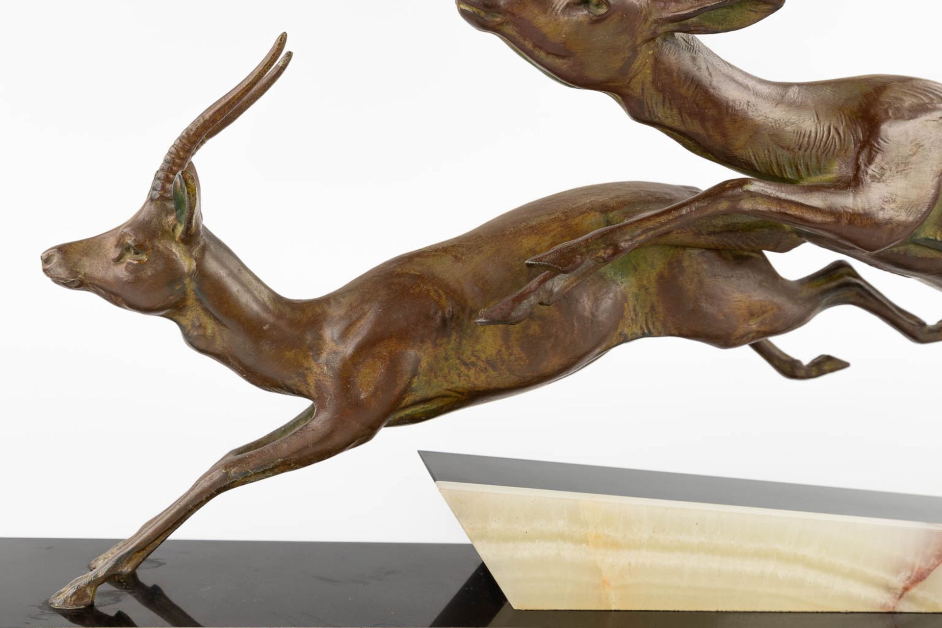 Two running deer, spelter on an onyx base, Art Deco. (L:11 x W:66 x H:31 cm) - Image 8 of 11