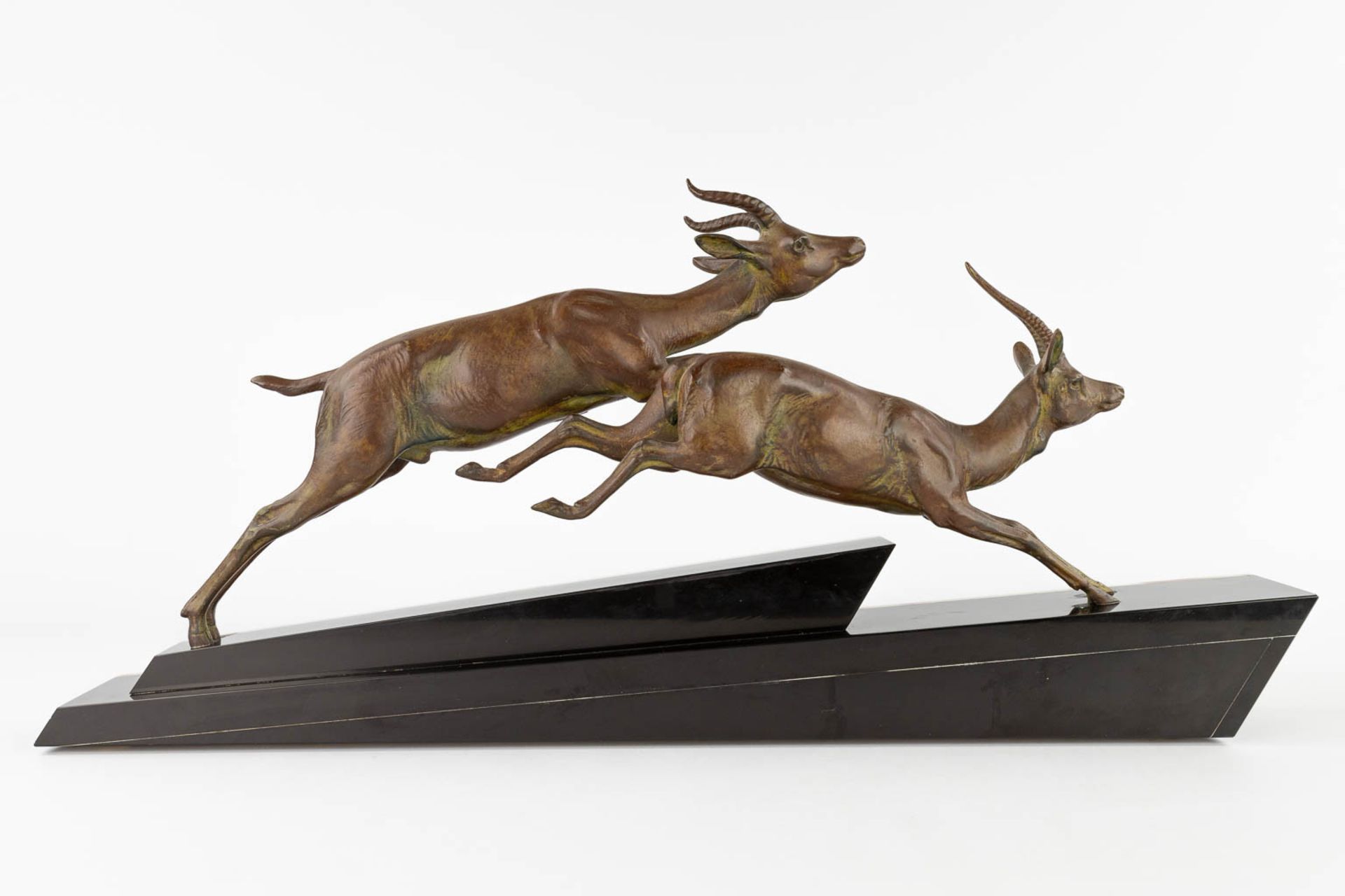 Two running deer, spelter on an onyx base, Art Deco. (L:11 x W:66 x H:31 cm) - Image 6 of 11