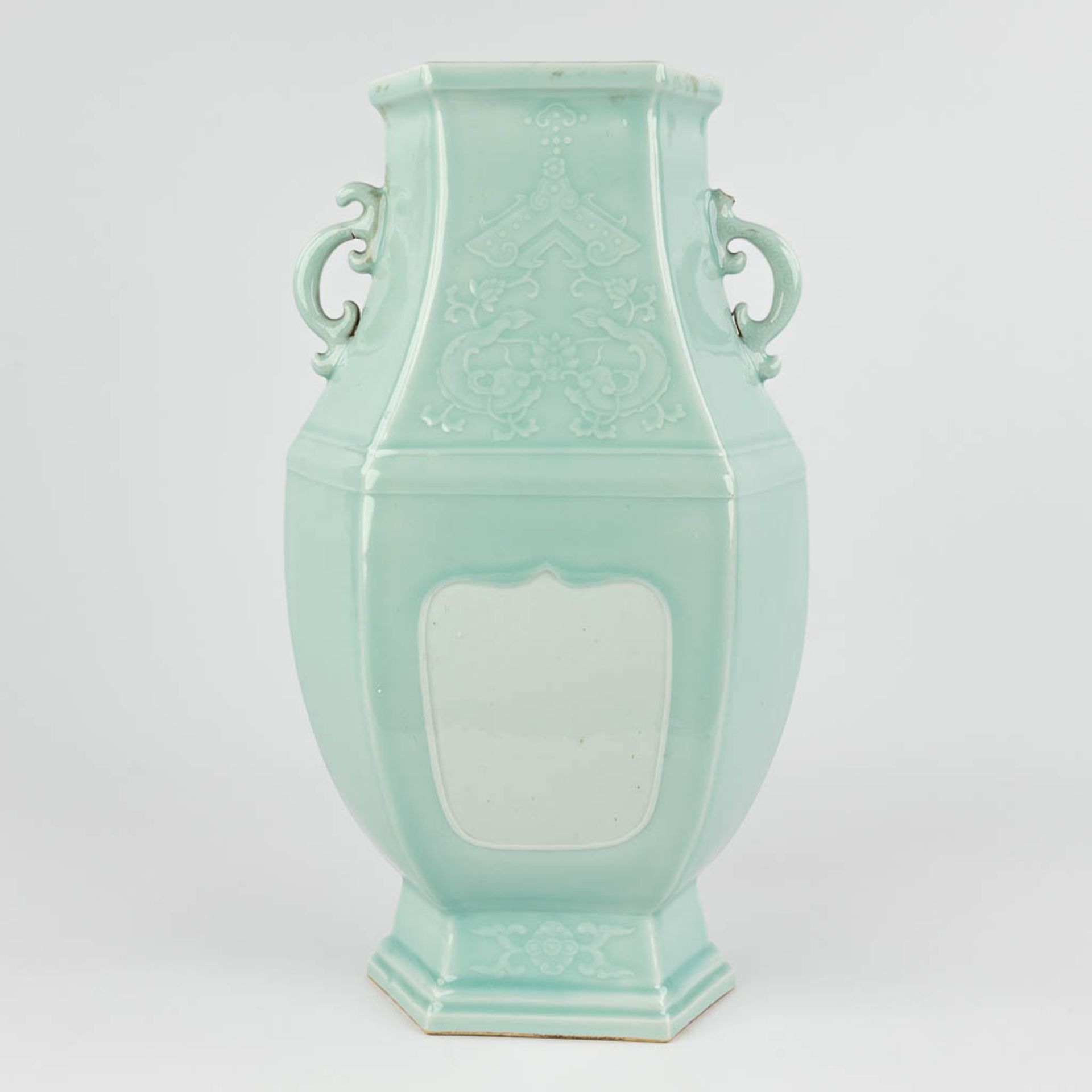 An antique Chinese celadon vase, Hexagonal, Qianlong mark and period. 18th C. (L:20 x W:26 x H:47 cm