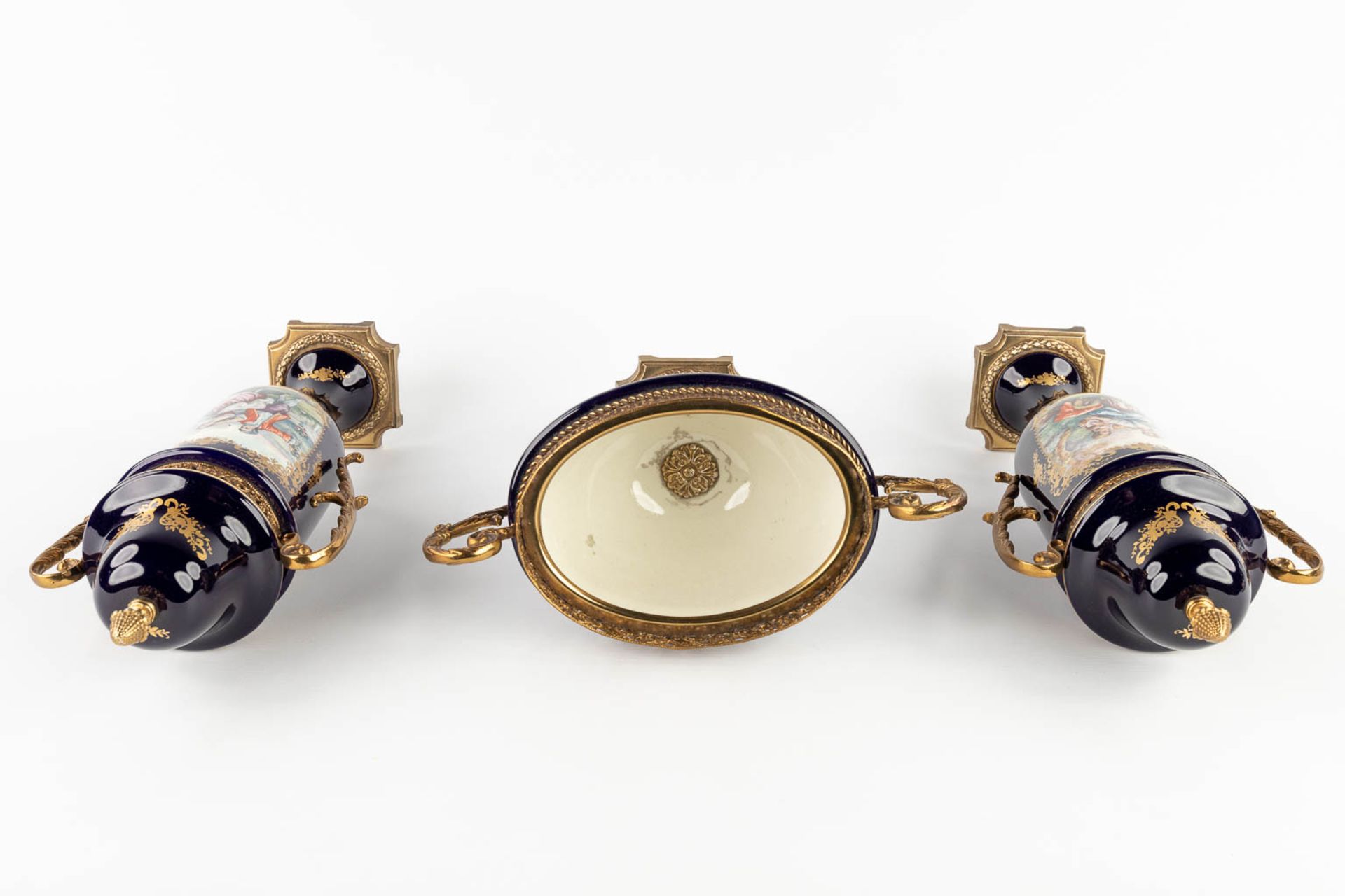 A three-piece mantle garniture, marked A.C.F. Sèvres. Porcelain mounted with bronze. 20th C. (L:11 x - Image 8 of 18