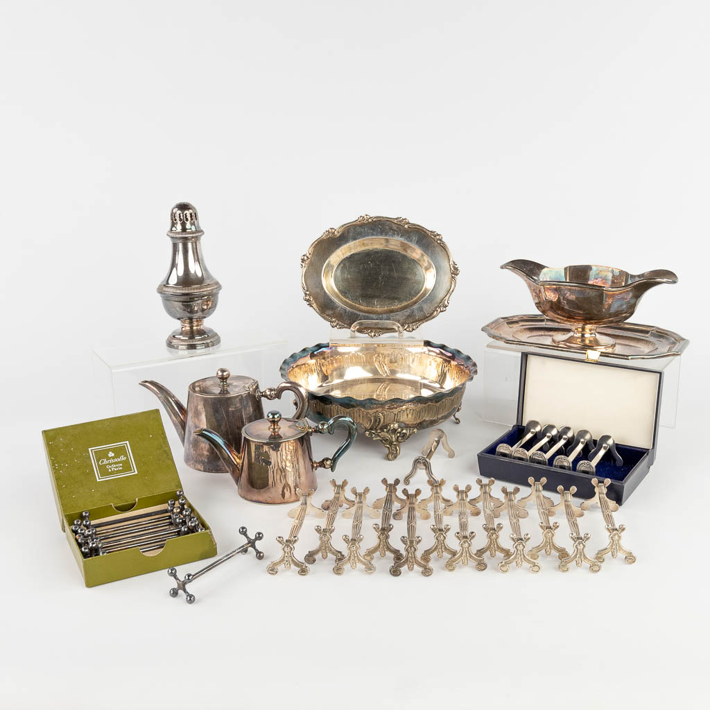 A set of table accessories and utensils, silver-plated metal. (H:8 x D:22 cm)