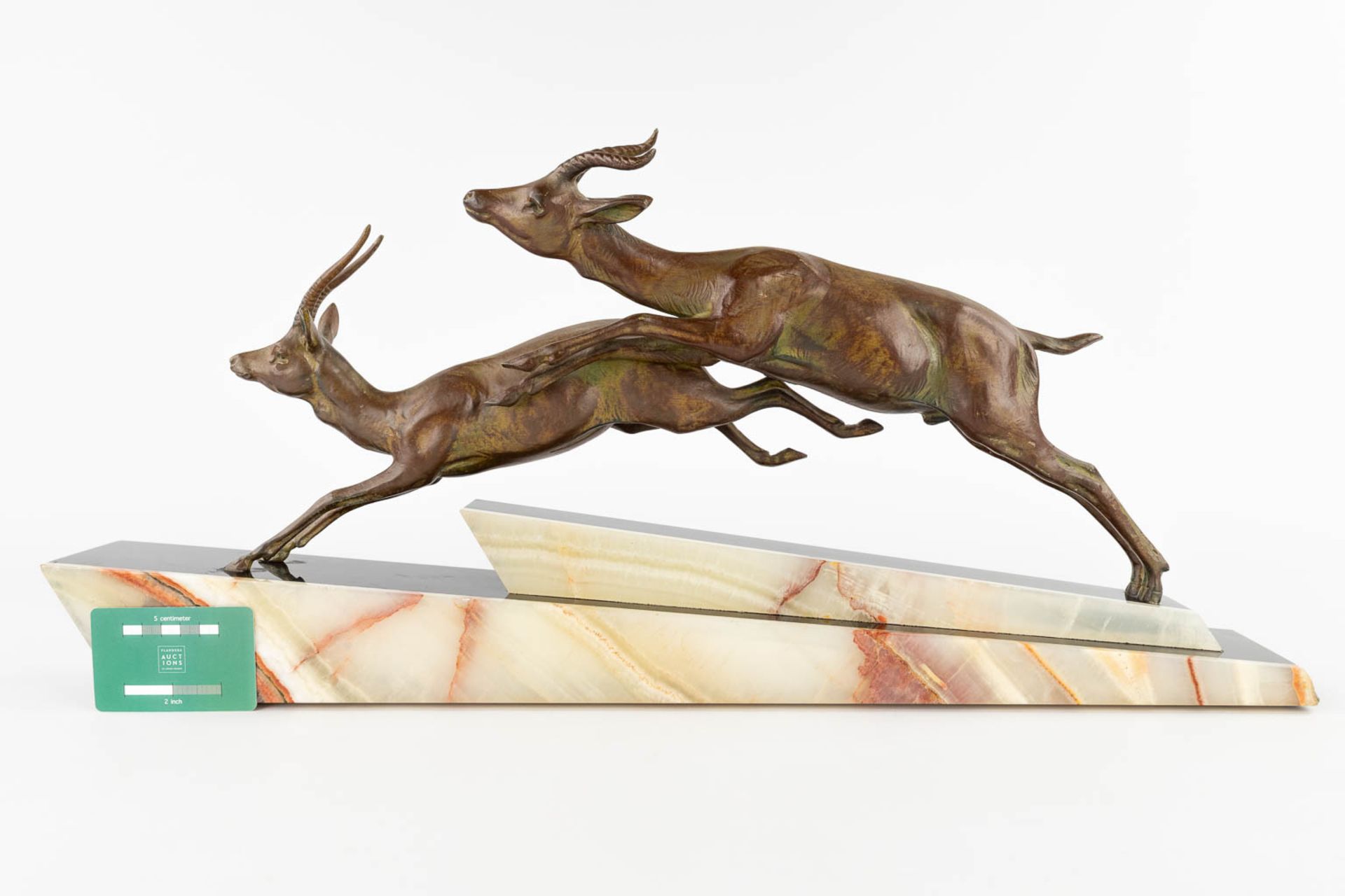 Two running deer, spelter on an onyx base, Art Deco. (L:11 x W:66 x H:31 cm) - Image 2 of 11