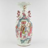 A Chinese Famille Rose vase, decorated with Wise men and items of good fortune. 19th C. (H:60 x D:25