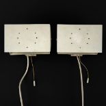 A pair of wall lights, patinated metal in the style of Charlotte Perriand. (L:10 x W:20,5 x H:12 cm)
