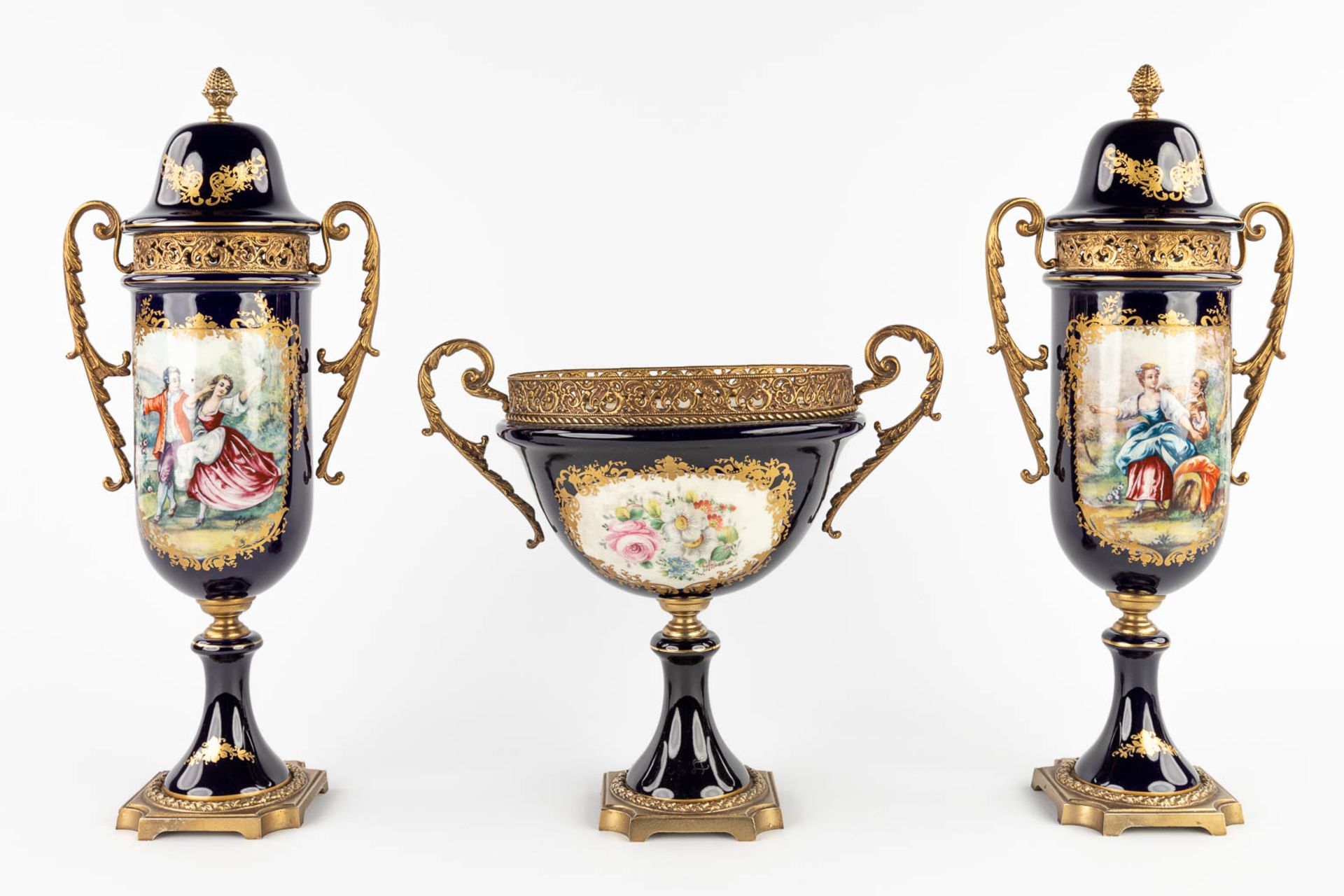 A three-piece mantle garniture, marked A.C.F. Sèvres. Porcelain mounted with bronze. 20th C. (L:11 x - Image 3 of 18