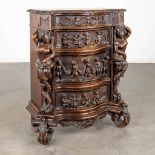 A Rococo-inspired commode, richly sculptured with mythological figurines, putti and ladies. Circa 19