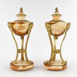 A pair of cassolettes, onyx mounted with bronze in Louis XVI style. Circa 1900. (H:45 x D:18 cm)