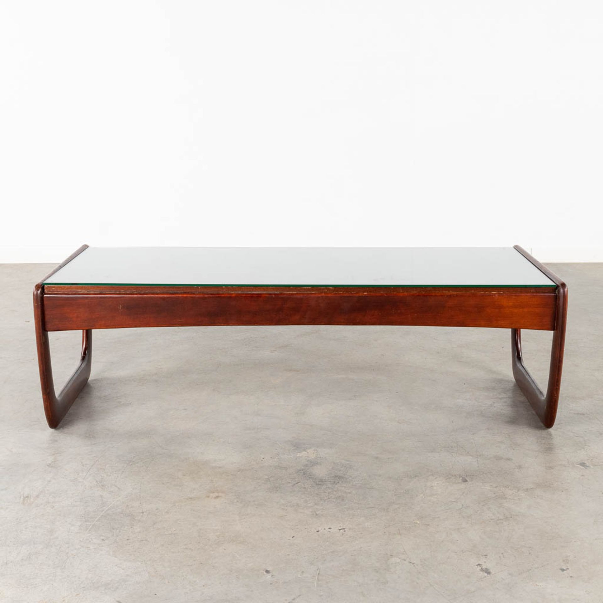 A mid-century coffee table with a glass top, probably teak. (L:30 x W:130 x H:40 cm) - Image 3 of 12