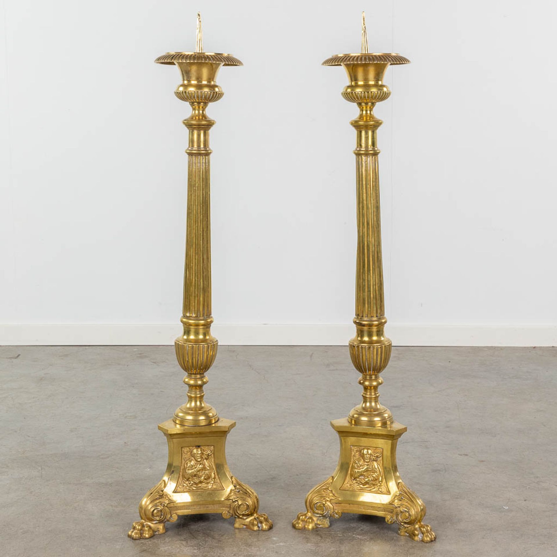 A pair of gold-plated and bronze church candle holders. Images of Joseph, Jesus and Mary. 19th C. (H - Image 5 of 12