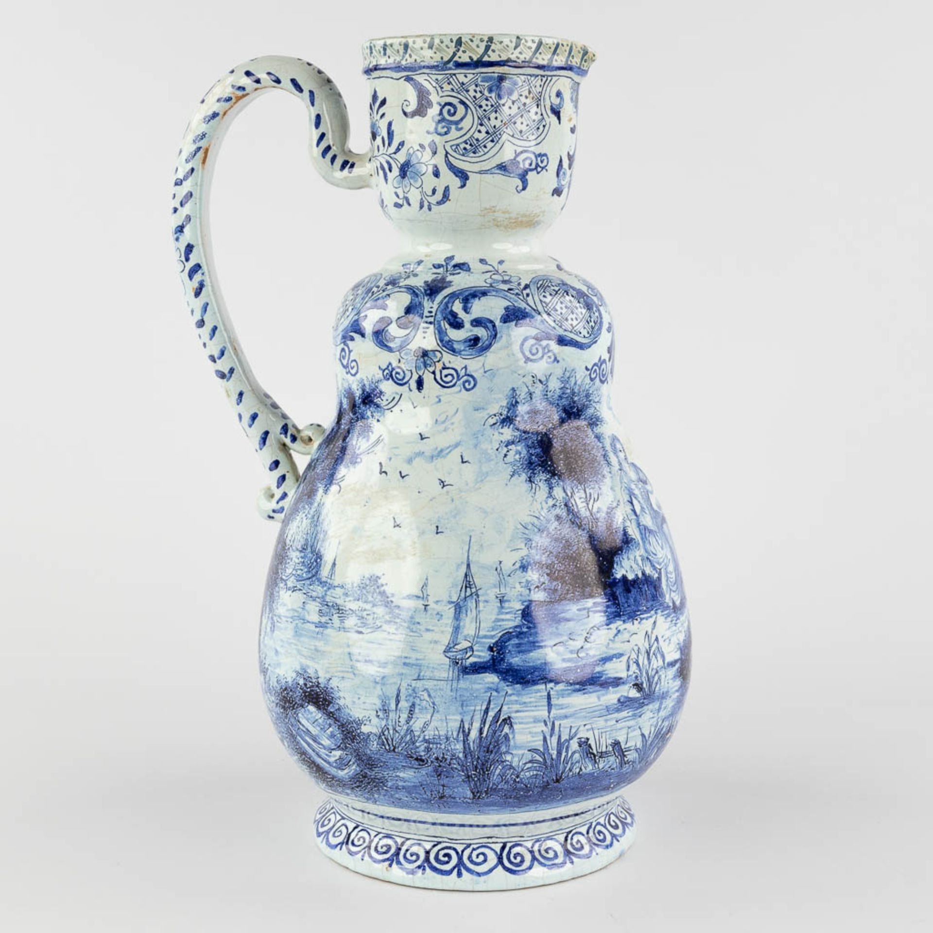 Delft, an antique pitcher with romantic scène, blue-white faience. 18th c. (L:17 x W:20 x H:33 cm) - Image 9 of 20