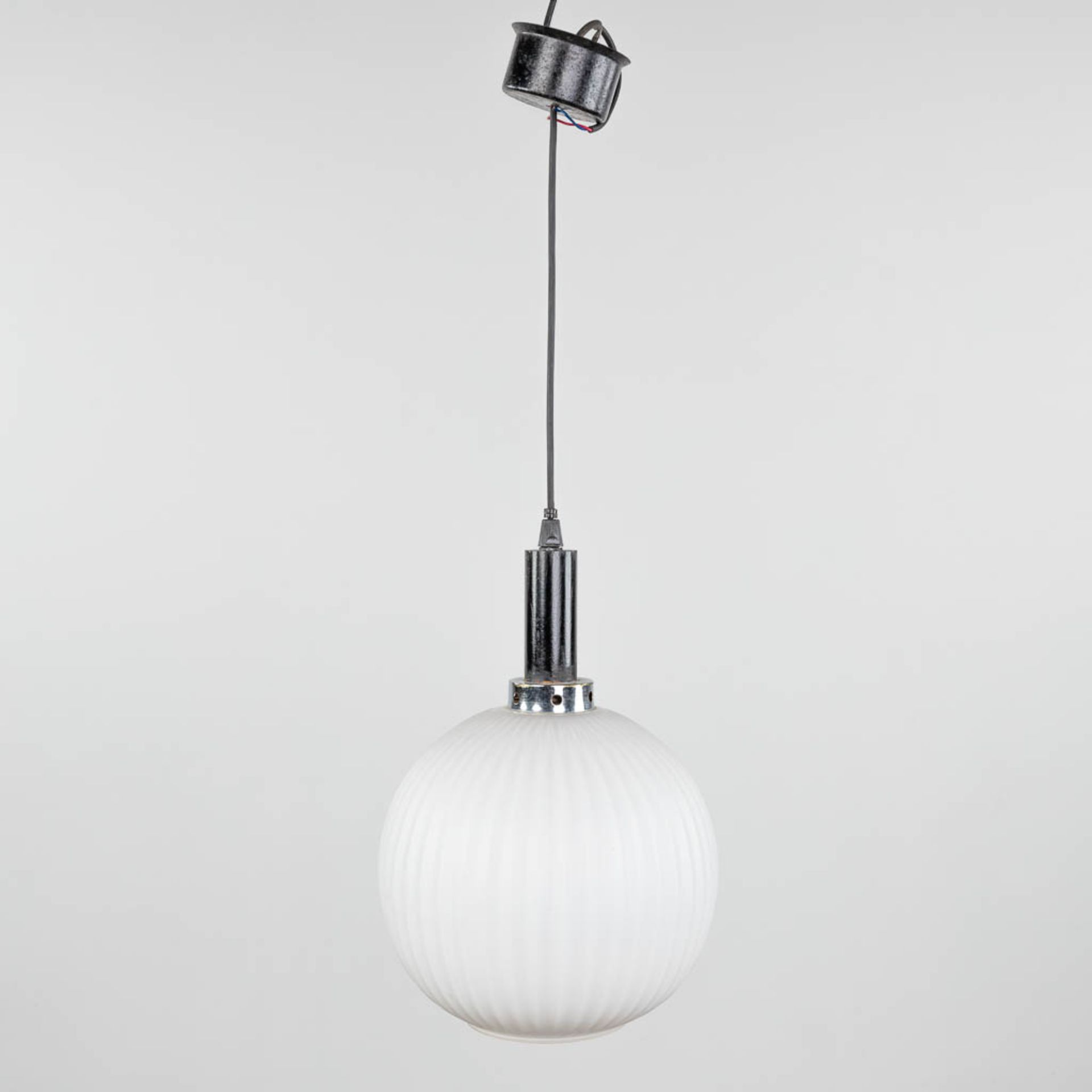 A suspension lamp, opaline glass and chromed metal. (H:40 x D:24 cm)