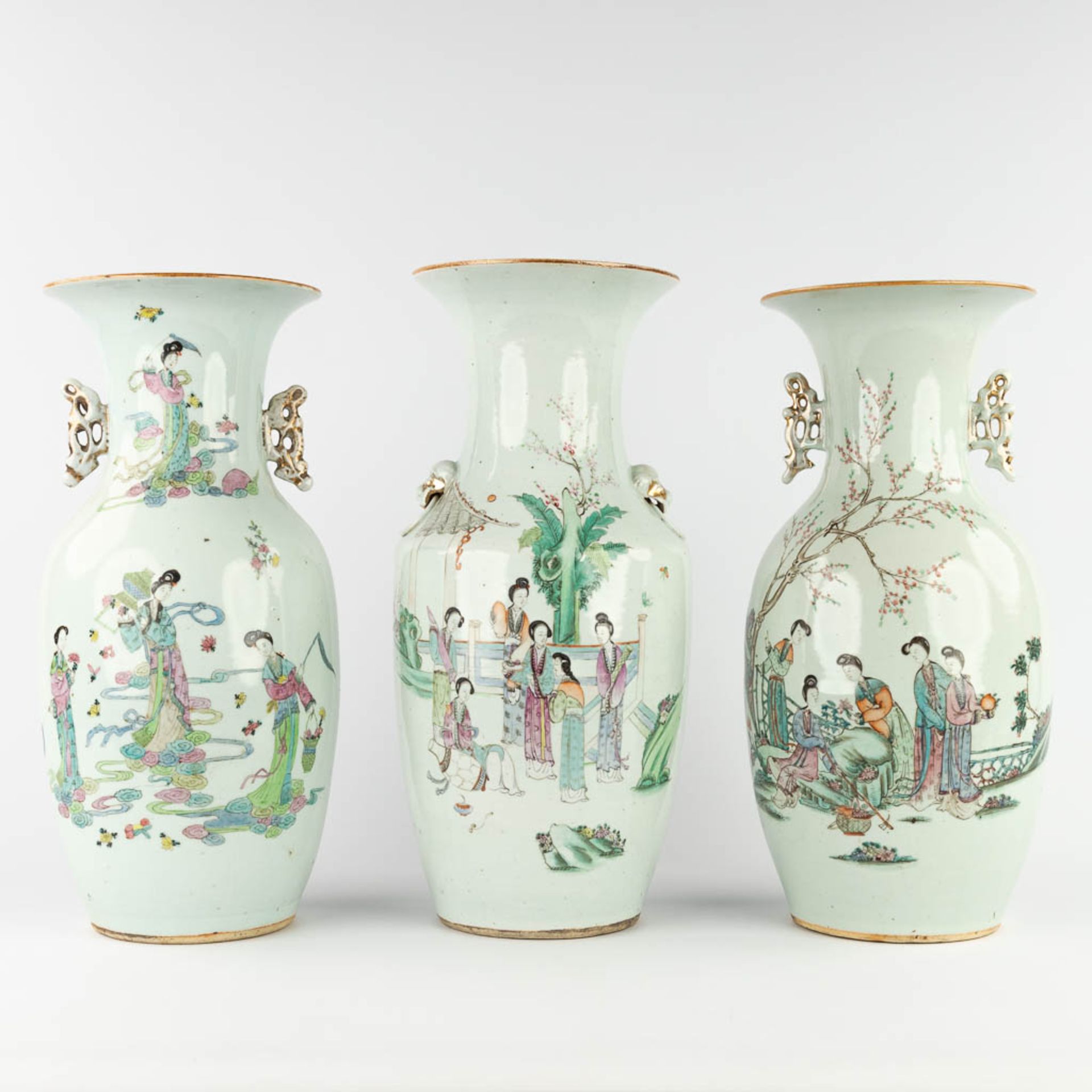 Three Chinese vases, decorated with ladies in the garden. 19th/20th C. (H:44 x D:21 cm)