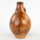 An antique Bartman jug with a single cartouche. 17th C. (H:21 x D:13 cm)