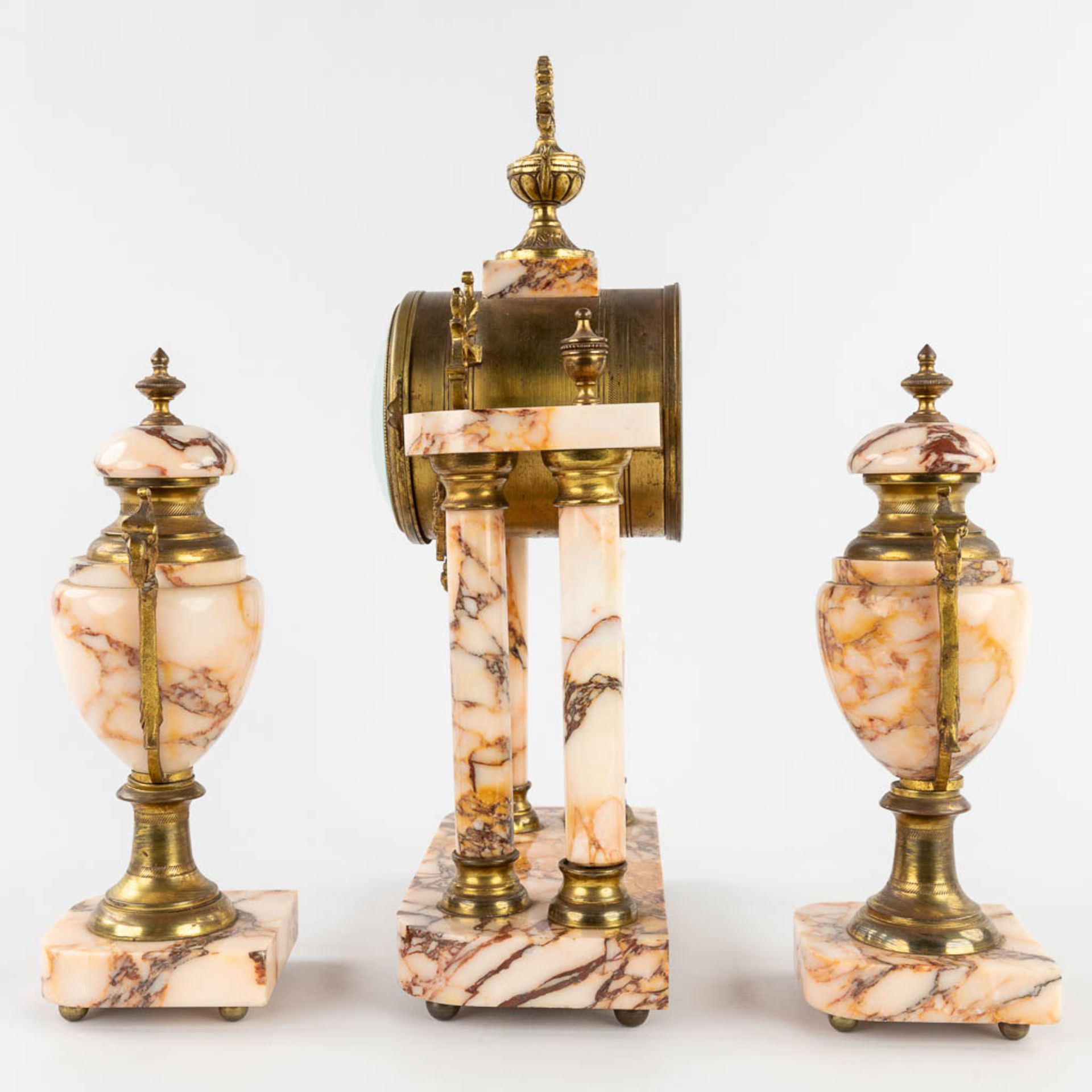 A three-piece mantle garniture, Clock with side pieces, marble mounted with bronze. Circa 1900. (L:1 - Image 7 of 13
