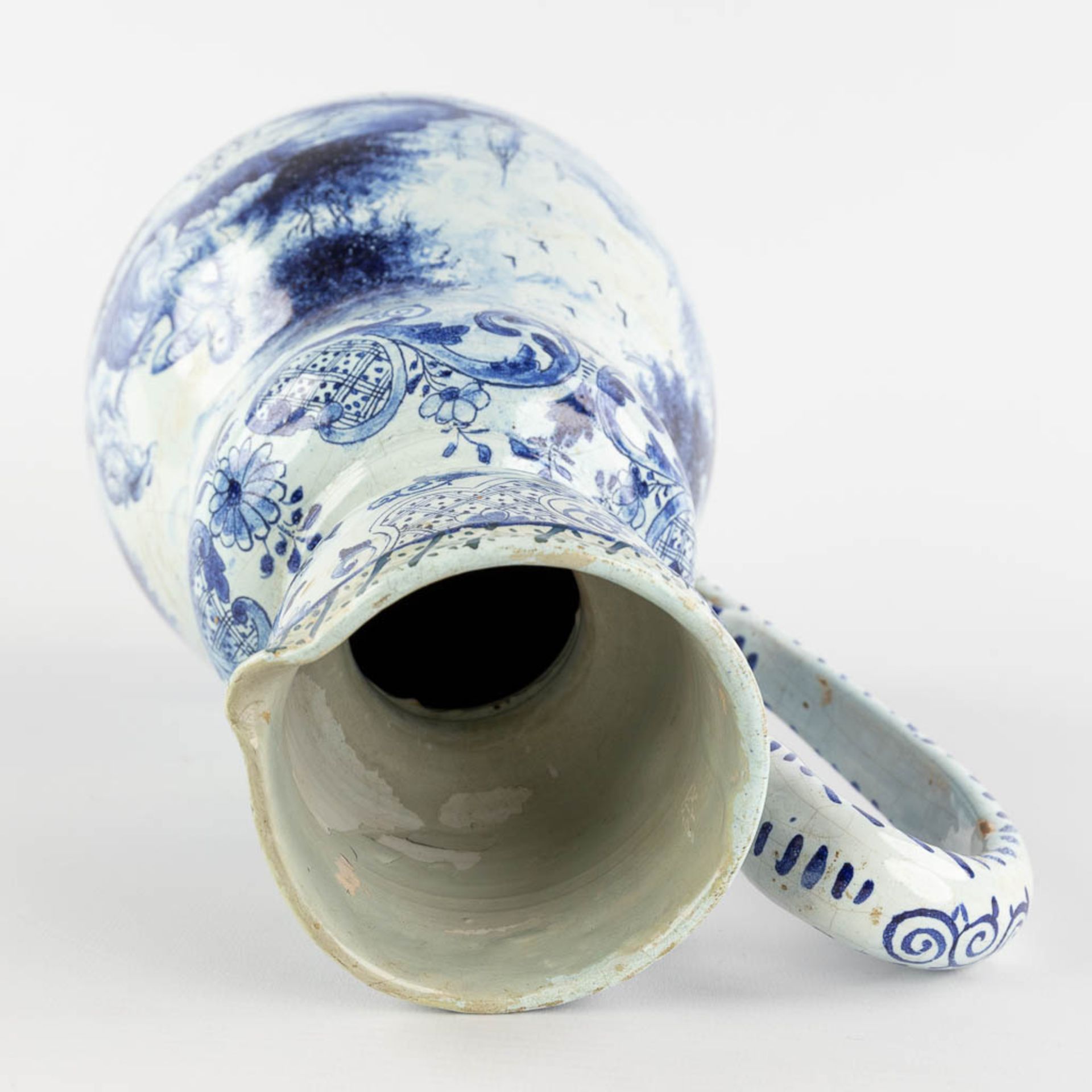 Delft, an antique pitcher with romantic scène, blue-white faience. 18th c. (L:17 x W:20 x H:33 cm) - Image 11 of 20