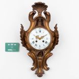 A Kartell clock, bronze in Louis XV style. 19th C. (L:13 x W:23 x H:42 cm)