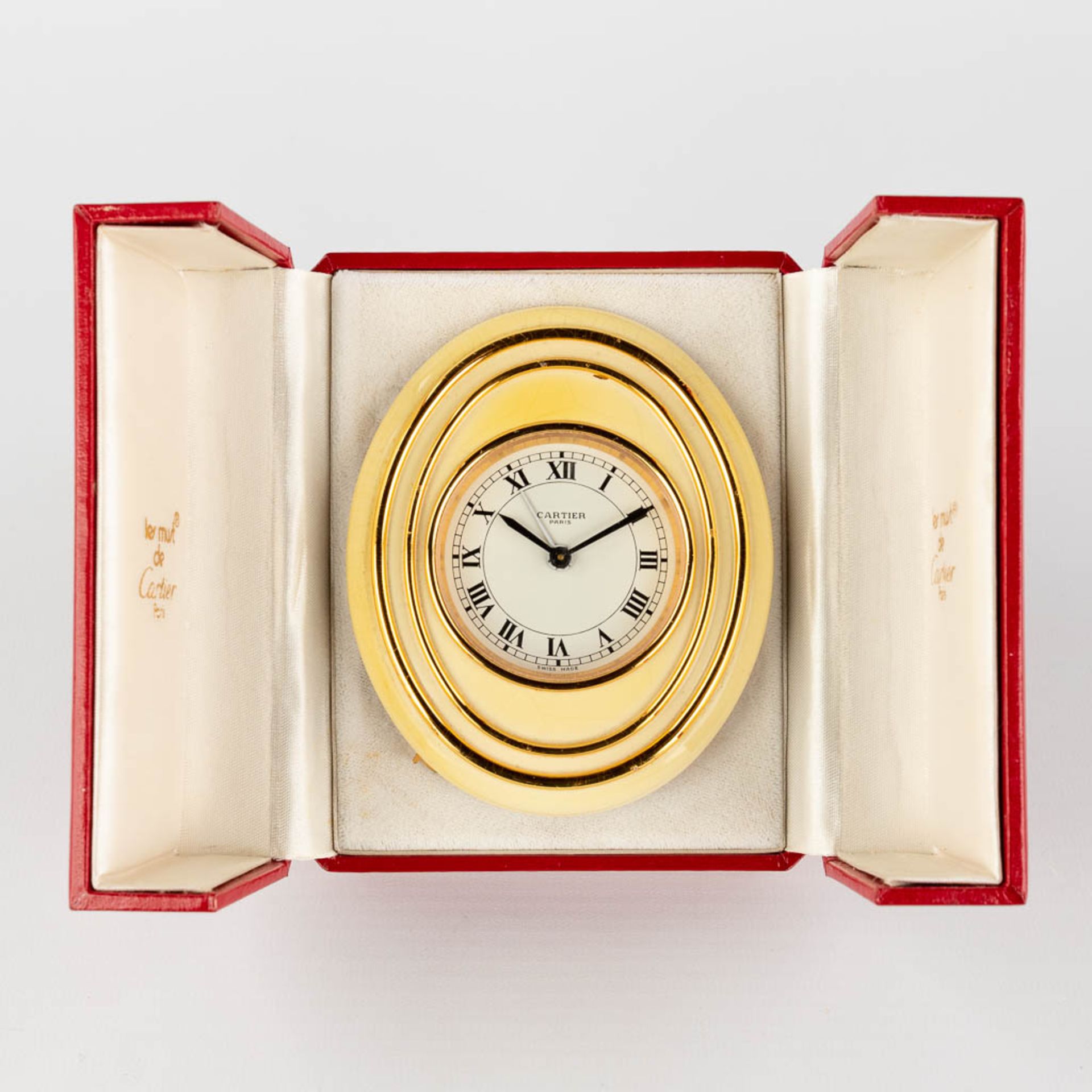 Cartier, a travel alarm clock, 7511 with the original box.