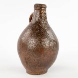 An antique Bartman jug with a single cartouche. 17th C. (H:23 x D:15 cm)