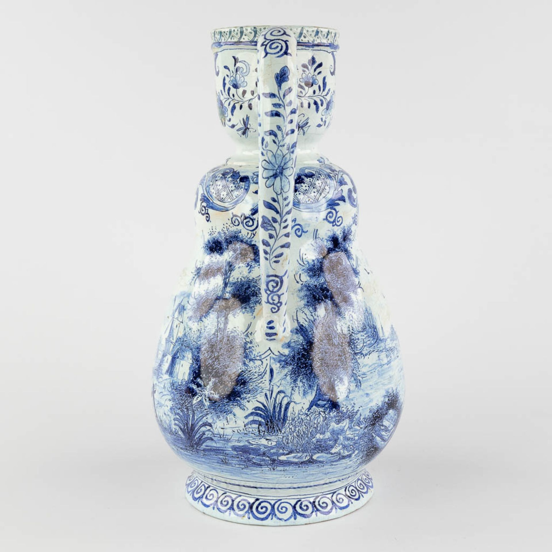 Delft, an antique pitcher with romantic scène, blue-white faience. 18th c. (L:17 x W:20 x H:33 cm) - Image 7 of 20