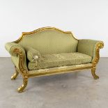 A two-person settee, sculptured wood upholstered with fabric in Empire style. 20th C. (L:65 x W:185