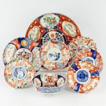 Eight pieces of Japanese Imari porcelain. 19th/20th C. (H:6,5 x D:47 cm)