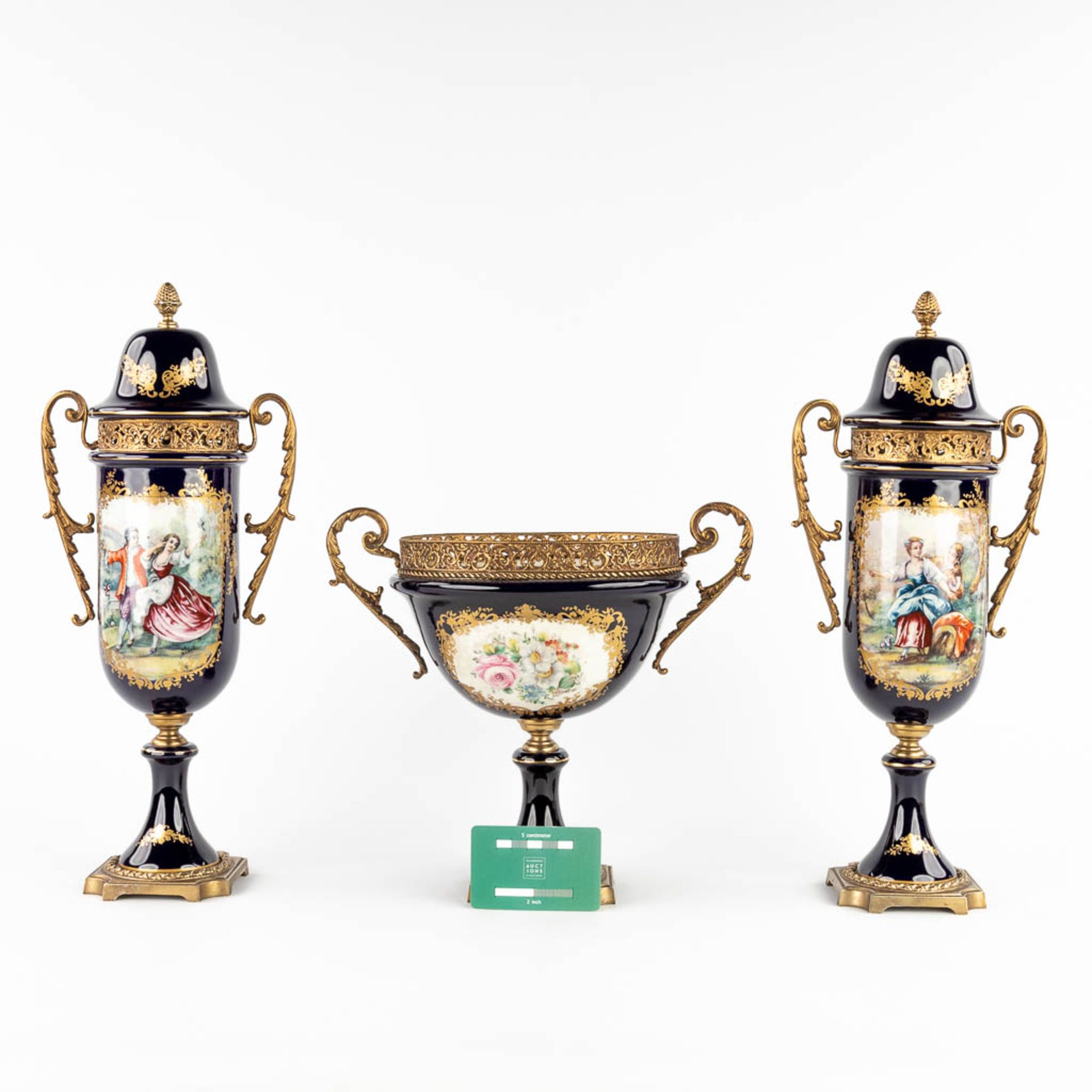 A three-piece mantle garniture, marked A.C.F. Sèvres. Porcelain mounted with bronze. 20th C. (L:11 x - Image 2 of 18