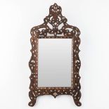 A mirror, wood inlaid with mother of pearl. 20th C. (W:35 x H:69 cm)