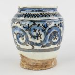 An Albarello, glazed stoneware with blue-white decor. North Africa. (H:15 x D:13 cm)