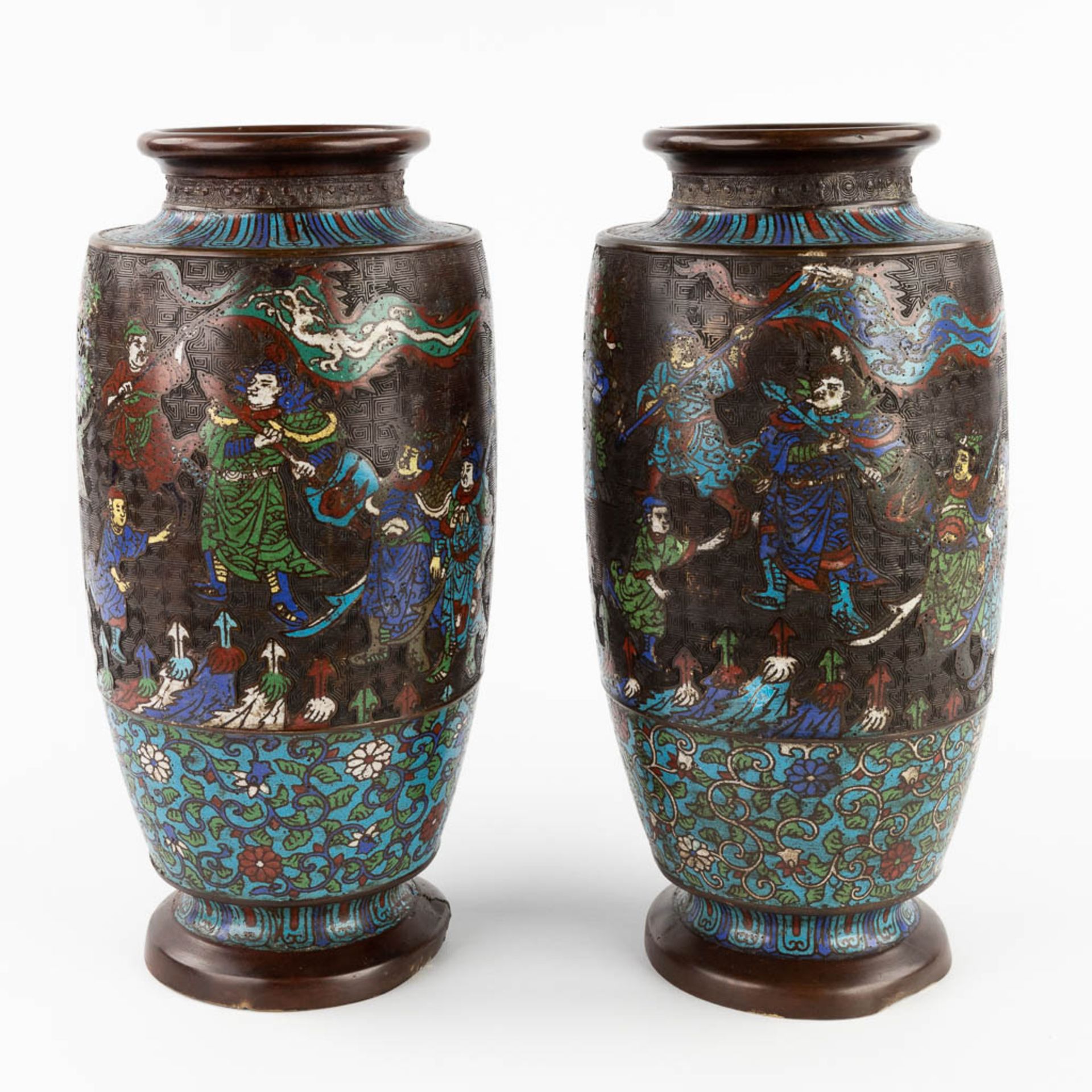 A pair of bronze vases with Champslevé decor. 19th C. (H:40 x D:20 cm)