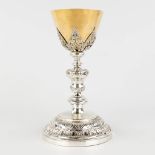 A silver-plated chalice with hammered, gold-plated cuppa. Circa 1900. (H:23,5 x D:14 cm)