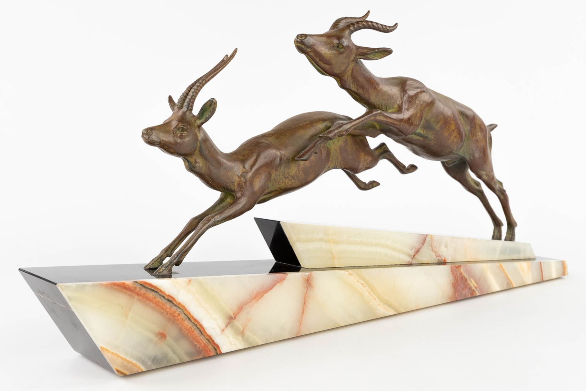 Two running deer, spelter on an onyx base, Art Deco. (L:11 x W:66 x H:31 cm) - Image 4 of 11