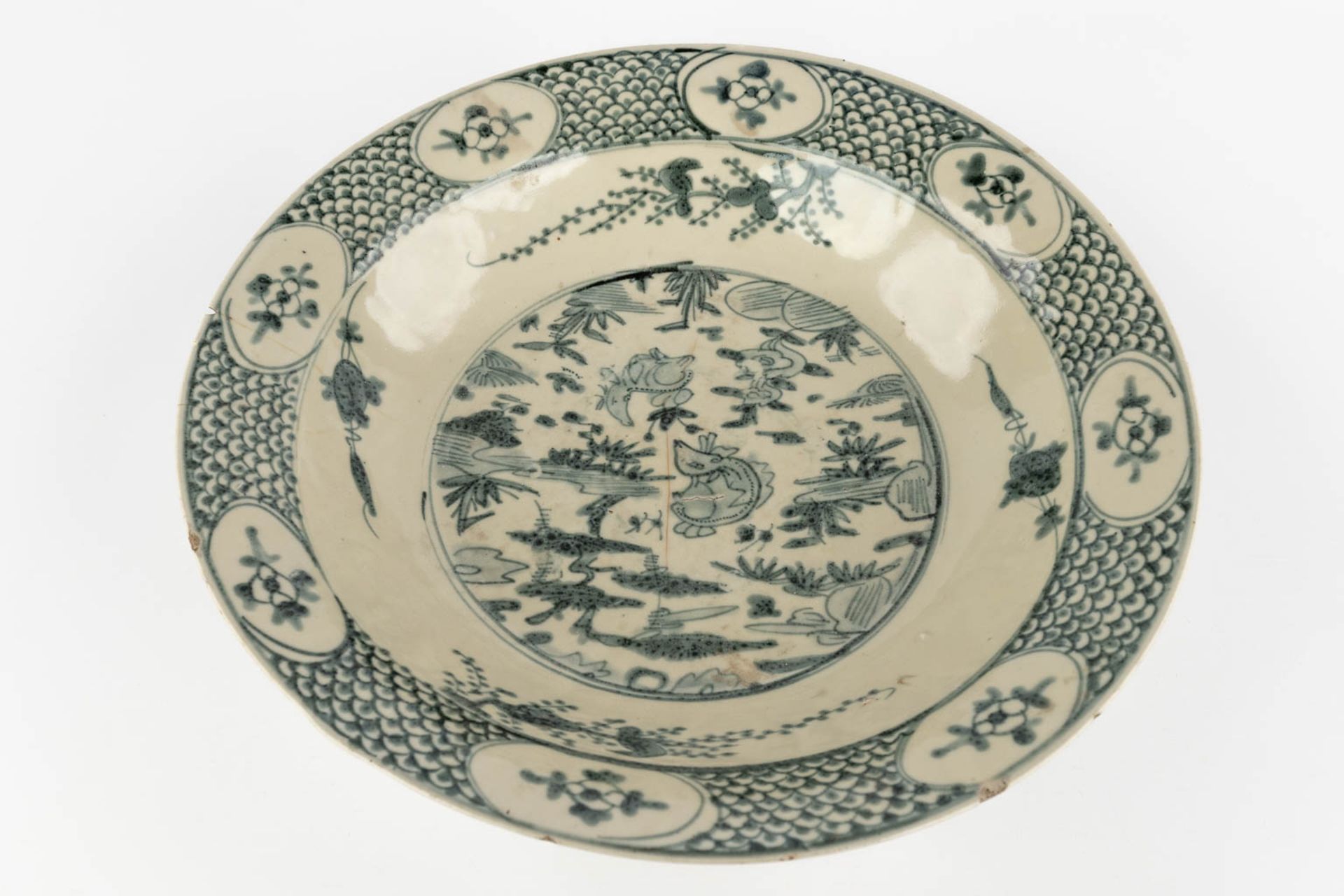 A large Chinese plate with blue-white decor 'Resting Deer'. (H:9 x D:39 cm) - Image 3 of 15