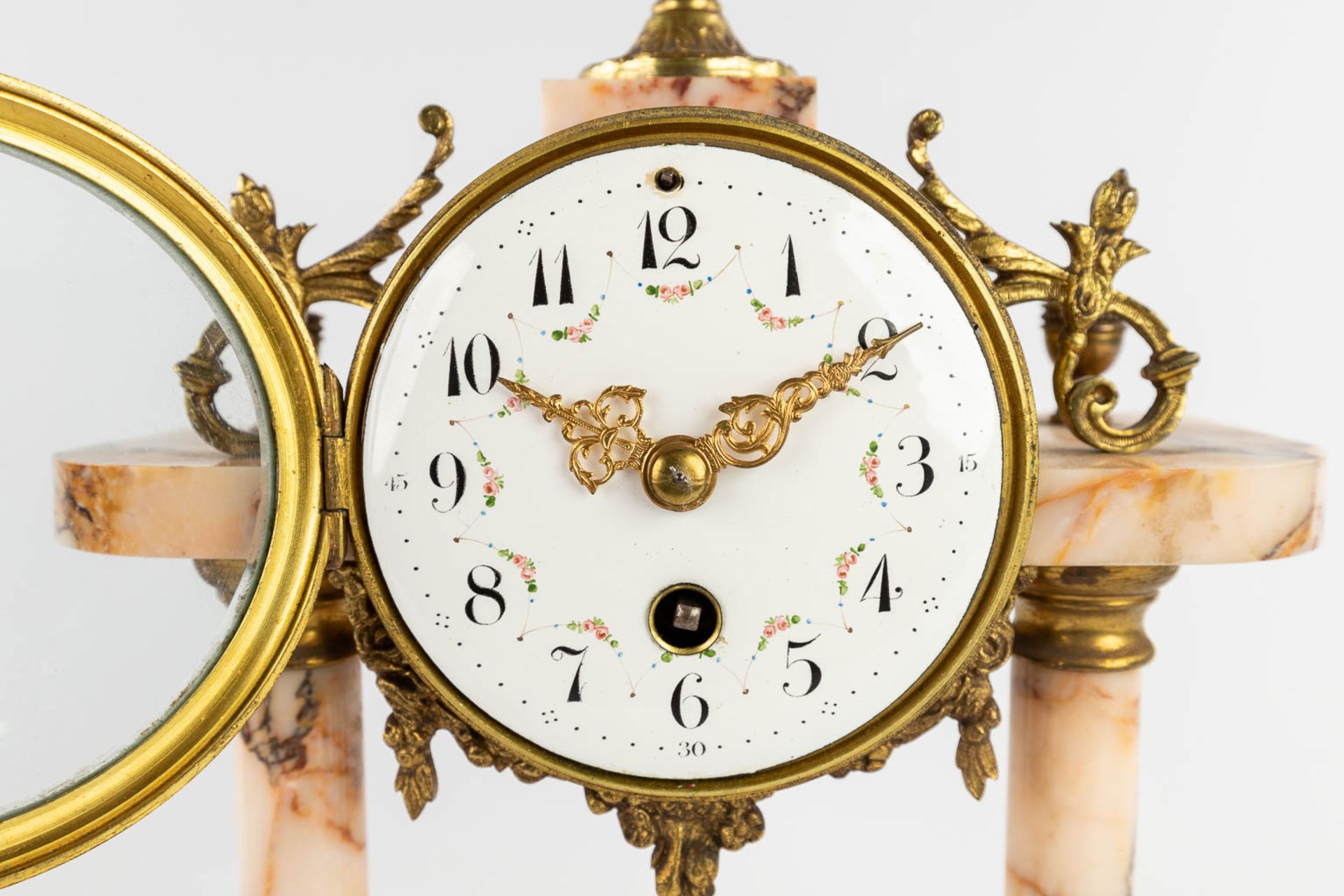 A three-piece mantle garniture, Clock with side pieces, marble mounted with bronze. Circa 1900. (L:1 - Image 10 of 13