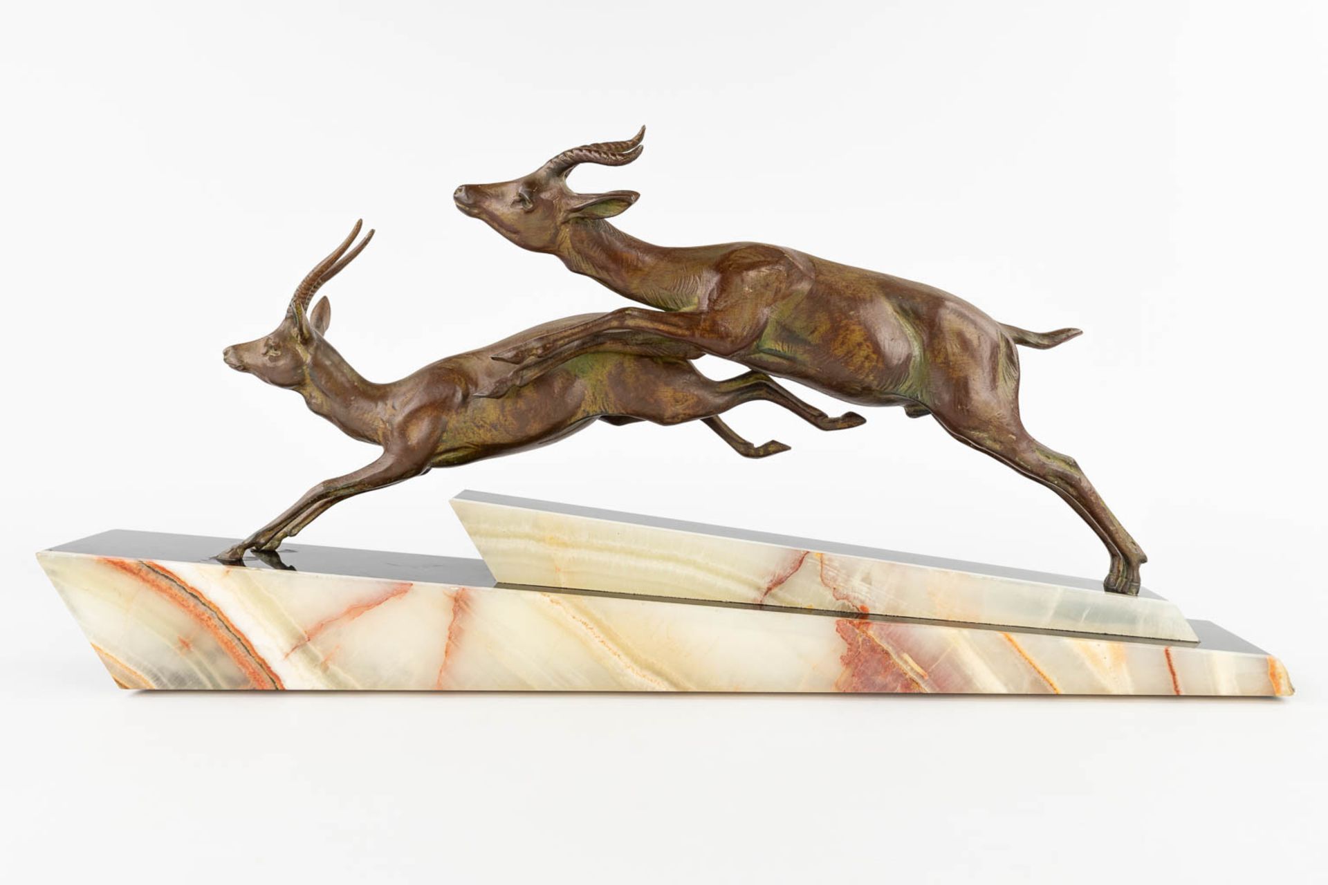 Two running deer, spelter on an onyx base, Art Deco. (L:11 x W:66 x H:31 cm) - Image 3 of 11