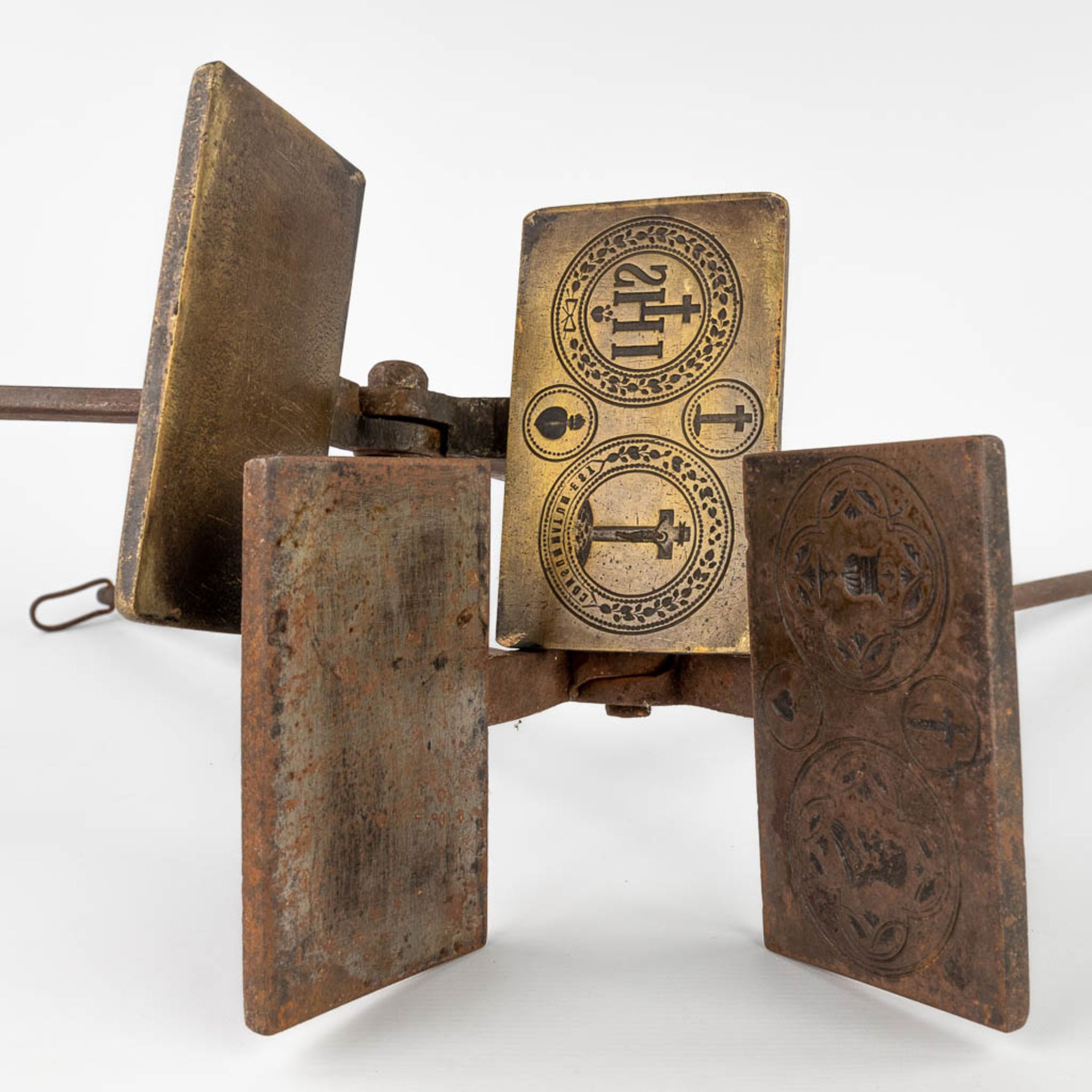 Two 'Sacred Bread' baking forms, bronze and metal, 19th C. (H:81 cm)