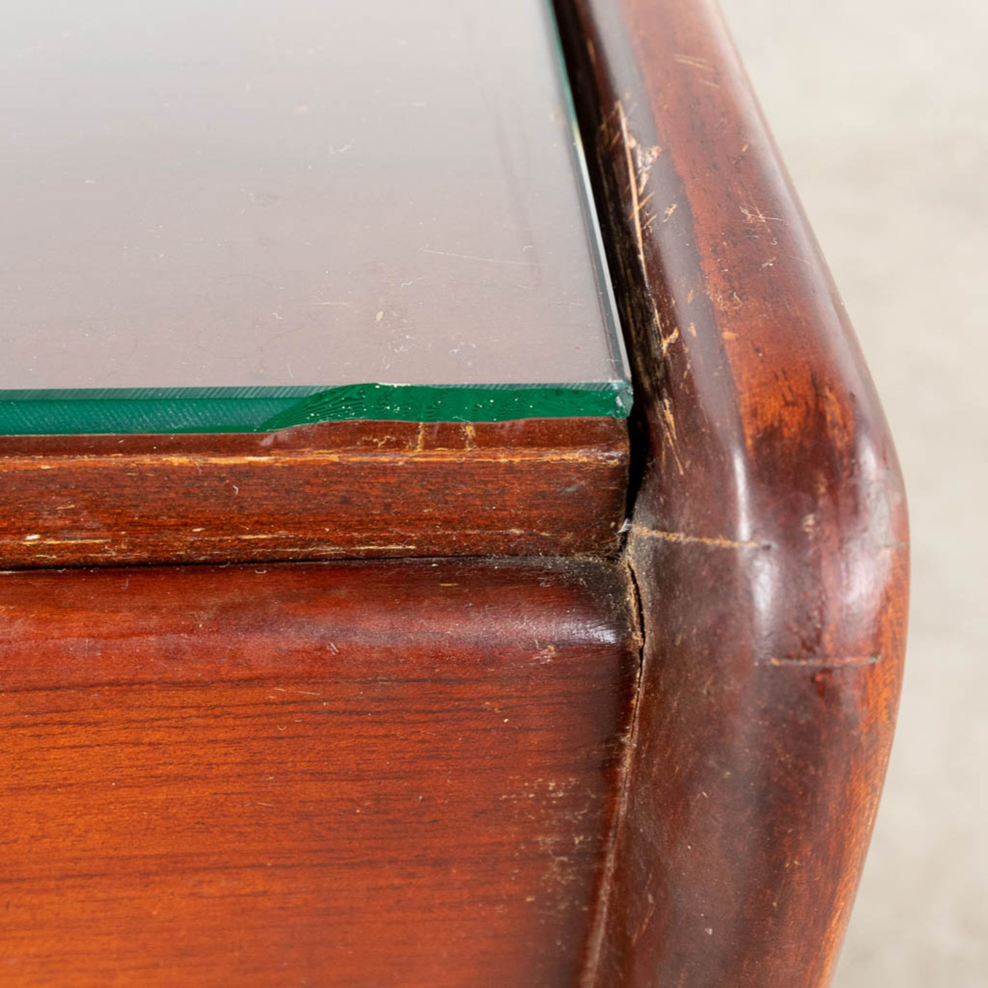 A mid-century coffee table with a glass top, probably teak. (L:30 x W:130 x H:40 cm) - Image 7 of 12