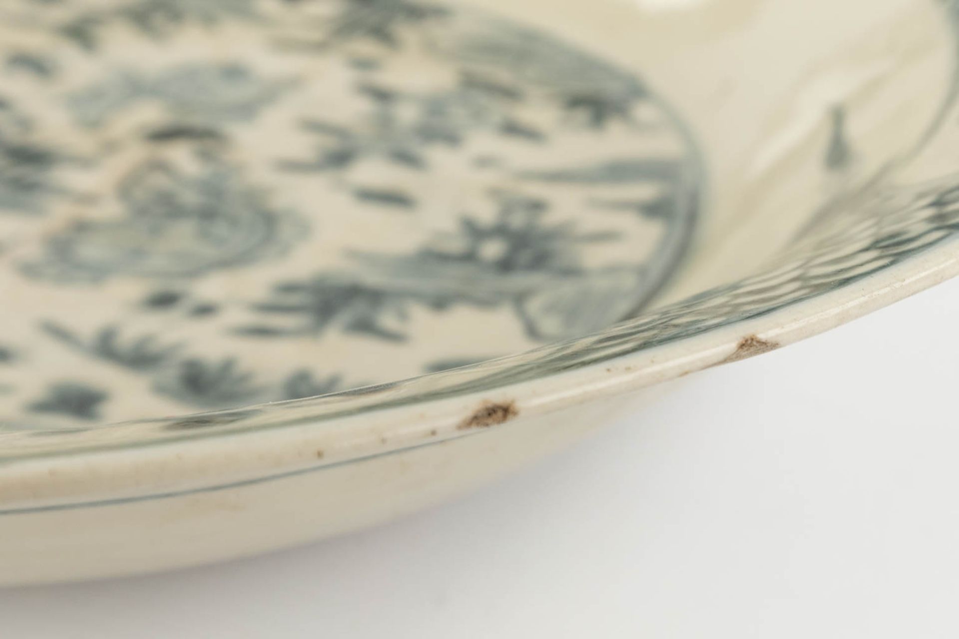 A large Chinese plate with blue-white decor 'Resting Deer'. (H:9 x D:39 cm) - Image 9 of 15
