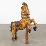 An antique wood sculptured figurine of a horse. (L:22 x W:66 x H:79 cm)