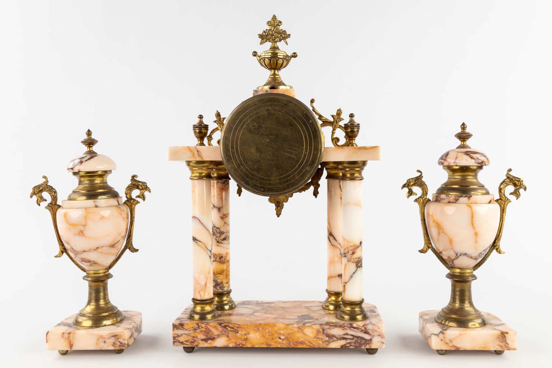 A three-piece mantle garniture, Clock with side pieces, marble mounted with bronze. Circa 1900. (L:1 - Image 6 of 13